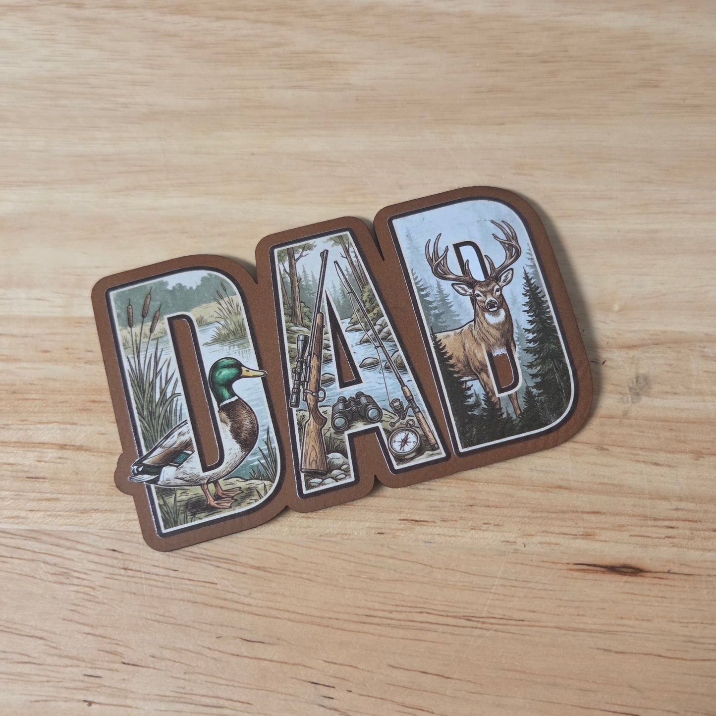 Hunting theme UV Printed Patch spelling out DAD with nature-themed designs on a Rawhide Leatherette.